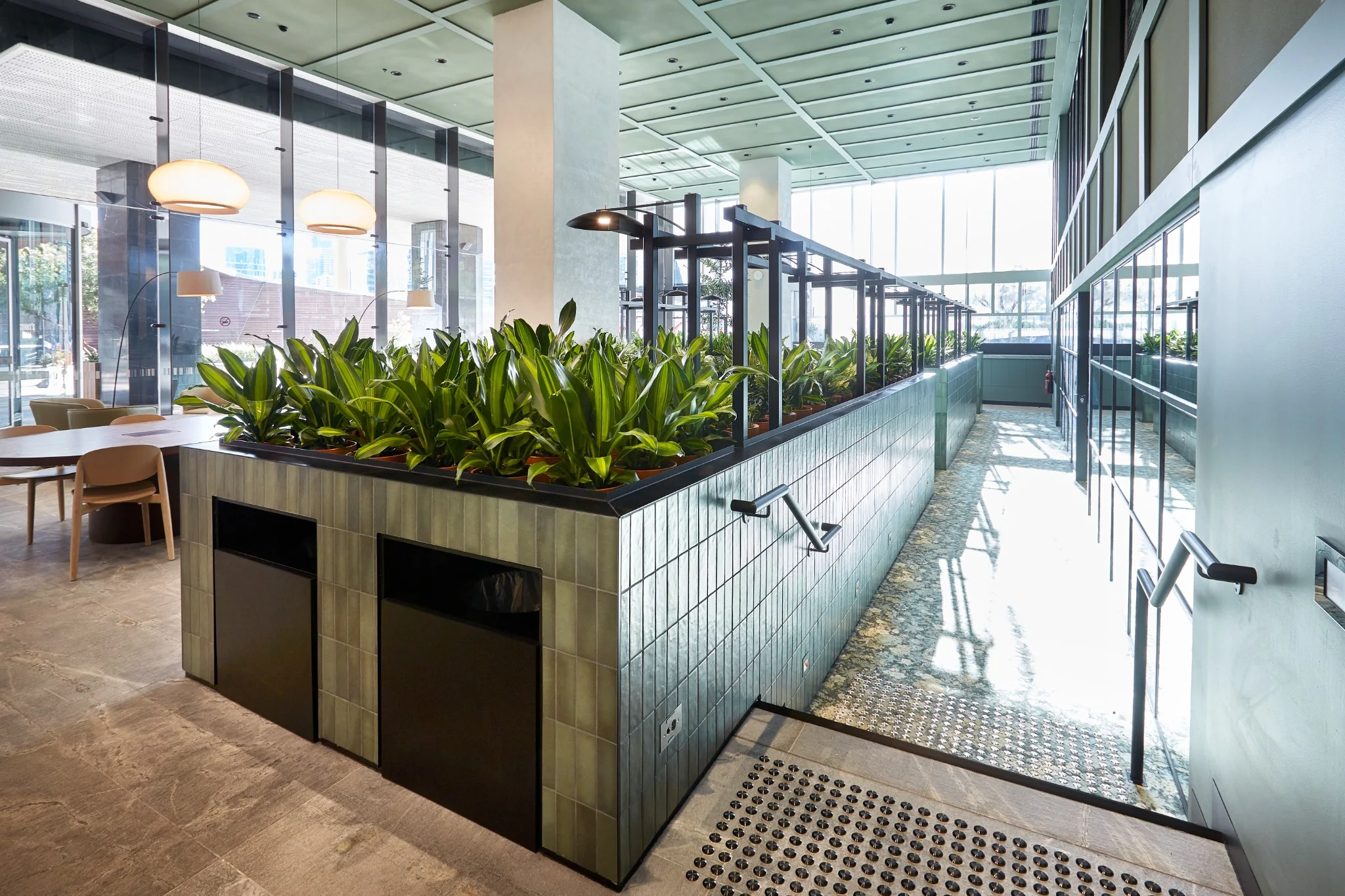 Feature tiled planter and integrated joinery at 717 Bourke Street