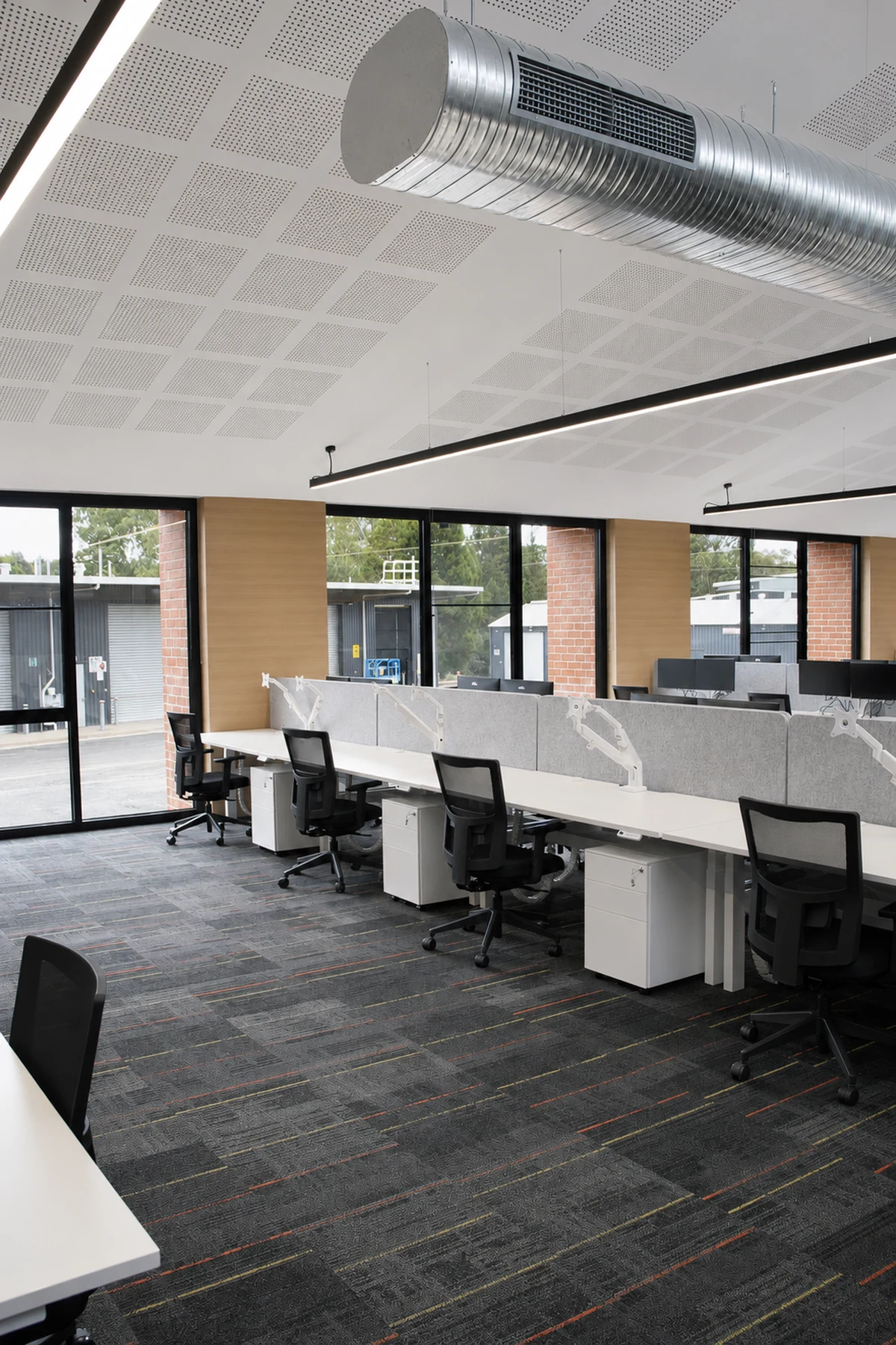 DEECA Broadford workplace acoustic ceiling, exposed ductwork and linear lighting
