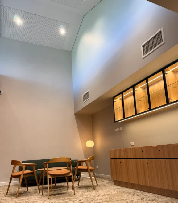 Completed visitor waiting area and illuminated display joinery